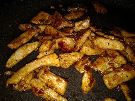 Stir fried pork marinated in soy sauce, lime, sugar, black pepper and garlic